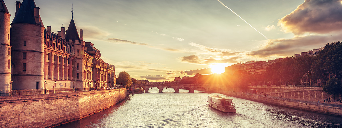 The sun setting over a european canal.